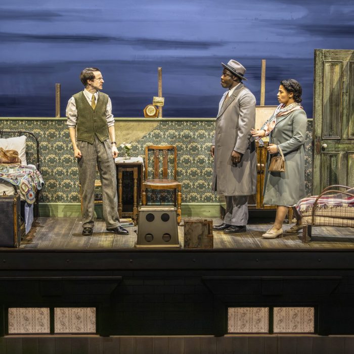 Mark Arends (Bernard), Daniel Ward (Gilbert) and Anna Crichlow (Hortense) in Small Island. Pamela Raith Photography